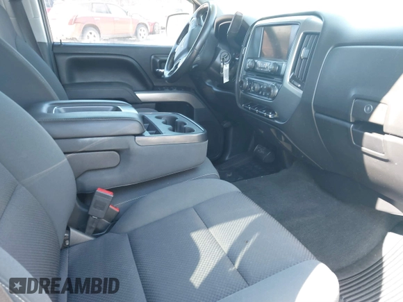 2014 Chevrolet Silverado 1500 LT with VIN 1GCVKREH3EZ320659, listed as a IAAI auction lot 41665352 with 105,574 mi miles and . Bid and sale history available at DreamBid. Image 5.