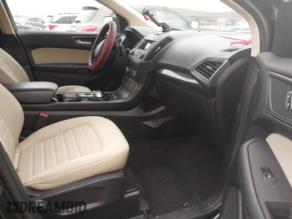 2019 Ford Edge SE with VIN 2FMPK4G97KBB82717, listed as a IAAI auction lot 42385647 with 102,616 mi miles and . Bid and sale history available at DreamBid. Image 5.