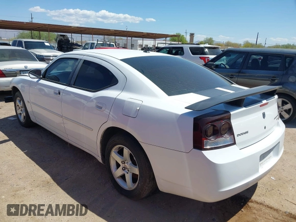 2010 Dodge Charger SXT with VIN 2B3CA3CV5AH297994, listed as a IAAI auction lot 42153457 with 157,017 mi miles. Bid and sale history available at carsss.com. Image 3.