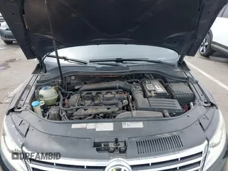 2013 Volkswagen CC Sport with VIN WVWBP7AN6DE504679, listed as a IAAI auction lot 42034362 with 148,527 mi miles. Bid and sale history available at carsss.com. Image 10.