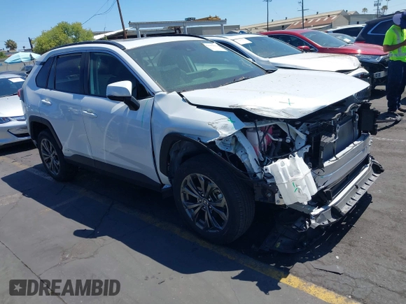 2023 Toyota RAV4 Hybrid XLE Premium with VIN JTMB6RFV0PD087237, listed as a IAAI auction lot 42606802 with 16,872 mi miles and . Bid and sale history available at DreamBid. Image 1.