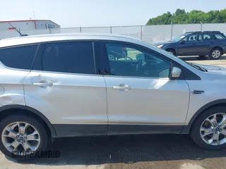 2013 Ford Escape SEL with VIN 1FMCU9H99DUA11243, listed as a IAAI auction lot 42356731 with 154,937 mi miles and . Bid and sale history available at DreamBid. Image 13.