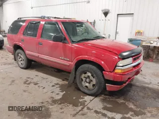 2004 Chevrolet Blazer LS z VIN 1GNDT13X34K157353, wystawiony jako IAAI lot #41089017 z przebiegiem 104 539 mil mil oraz . Historia ofert i sprzedaży dostępna na DreamBid. Obrazek 1.