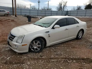 2009 Cadillac STS RWD z VIN 1G6DW67V290163754, wystawiony jako Copart lot #44910875 z przebiegiem 142 732 mil mil oraz Szkoda całkowita • Salvage title. Historia ofert i sprzedaży dostępna na DreamBid. Obrazek 1.