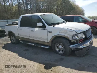 2002 Ford F-150 XLT with VIN 1FTRW07L32KE29159, listed as a Copart auction lot 50596125 with 198,058 mi miles and Salvage Title. Bid and sale history available at carsss.com. Image 4.