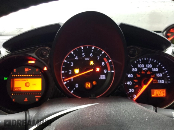 2014 Nissan 370Z Nismo with VIN JN1AZ4EH2EM636132, listed as a Copart auction lot 87218744 with 39,254 mi miles and Salvage Title. Bid and sale history available at DreamBid. Image 9.