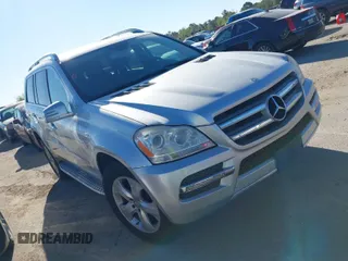 2012 Mercedes-Benz GL-Class GL 450 with VIN 4JGBF7BEXCA790264, listed as a IAAI auction lot 41842489 with 128,264 mi miles. Bid and sale history available at carsss.com. Image 1.