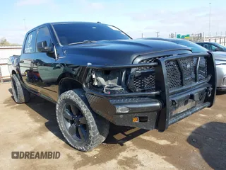 2015 Ram 1500 Express z VIN 3C6RR6KT1FG637739, wystawiony jako IAAI lot #41911134 z przebiegiem 219 048 mil mil oraz . Historia ofert i sprzedaży dostępna na DreamBid. Obrazek 1.