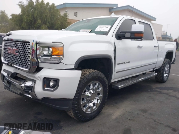 2015 GMC Sierra 2500HD Denali with VIN 1GT120E85FF681680, listed as a IAAI auction lot 42081711 with 67,676 mi miles and . Bid and sale history available at DreamBid. Image 2.