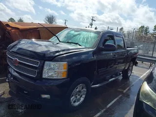 2013 Chevrolet Silverado 1500 LT with VIN 3GCPKSE71DG329253, listed as a IAAI auction lot 41723597 with 164,539 mi miles. Bid and sale history available at carsss.com. Image 2.