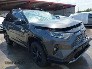 2021 Toyota RAV4 Hybrid XSE with VIN 2T3E6RFV8MW026973, listed as a IAAI auction lot 42052289 with 94,857 mi miles and . Bid and sale history available at DreamBid. Image 1.