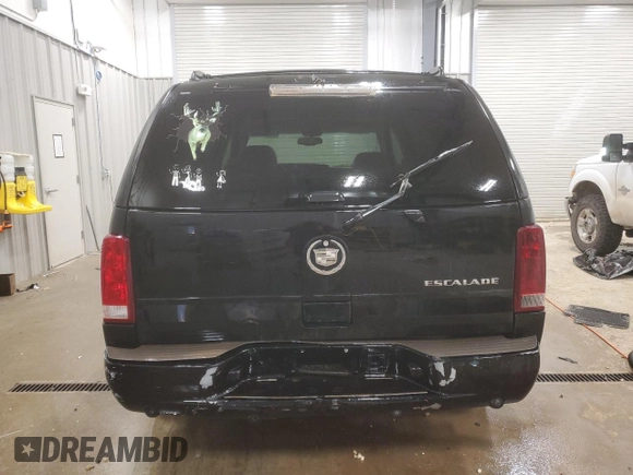 2003 Cadillac Escalade with VIN 1GYEC63T53R151013, listed as a Copart auction lot 86536944 with 420,451 mi miles and Salvage title. Bid and sale history available at DreamBid. Image 6.