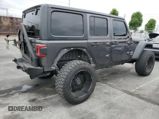 2019 Jeep Wrangler Unlimited Sport S with VIN 1C4HJXDG5KW535115, listed as a Copart auction lot 58404545 with 95,491 mi miles and Salvage title. Bid and sale history available at DreamBid. Image 3.