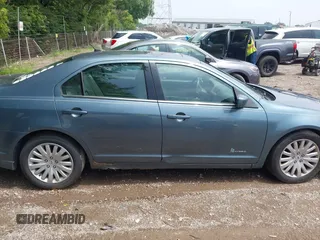 2011 Ford Fusion Hybrid with VIN 3FADP0L37BR302056, listed as a IAAI auction lot 42680595 with 276,846 mi miles and . Bid and sale history available at DreamBid. Image 13.