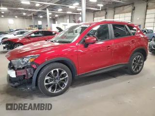2016 Mazda CX-5 Grand Touring with VIN JM3KE4DY7G0701881, listed as a Copart auction lot 52872925 with 118,559 mi miles and Salvage Title. Bid and sale history available at carsss.com. Image 1.