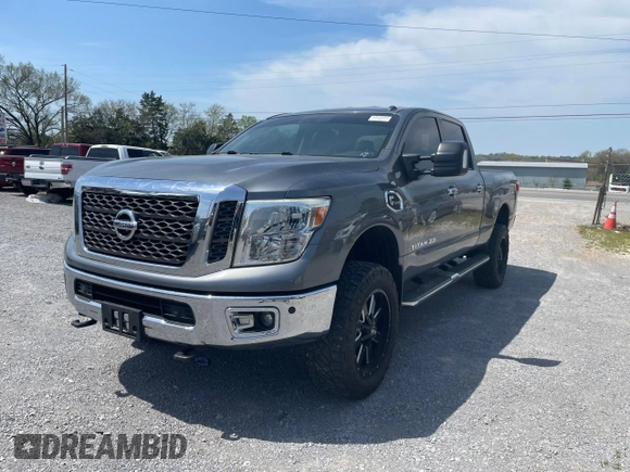 2016 Nissan Titan Platinum Reserve z VIN 1N6BA1F2XGN516798, wystawiony jako Copart lot #53584635 z przebiegiem 104 737 mil mil oraz Czysty tytuł • Clean title. Historia ofert i sprzedaży dostępna na DreamBid. Obrazek 2.