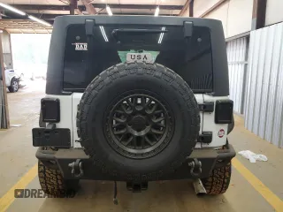2012 Jeep Wrangler Unlimited Sport z VIN 1C4BJWDG4CL140250, wystawiony jako Copart lot #55174665 z przebiegiem 91 285 mil mil oraz Szkoda całkowita • Salvage title. Historia ofert i sprzedaży dostępna na DreamBid. Obrazek 6.