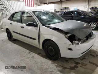 2002 Ford Focus LX with VIN 1FAFP33P52W126344, listed as a Copart auction lot 49757324 with 140,612 mi miles and Salvage Title. Bid and sale history available at DreamBid. Image 4.