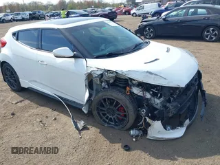 2013 Hyundai Veloster Turbo with VIN KMHTC6AE6DU097460, listed as a IAAI auction lot 42099379 with 82,240 mi miles and . Bid and sale history available at DreamBid. Image 1.
