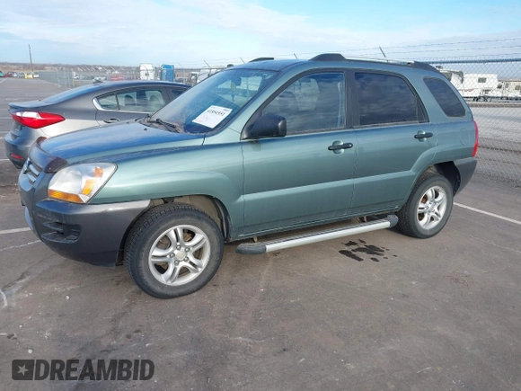 2008 Kia Sportage LX with VIN KNDJE723787521869, listed as a IAAI auction lot 41854551 with 167,997 mi miles. Bid and sale history available at carsss.com. Image 2.