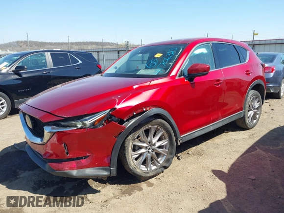 2019 Mazda CX-5 Grand Touring with VIN JM3KFADM5K1556917, listed as a IAAI auction lot 41706323 with 77,804 mi miles. Bid and sale history available at carsss.com. Image 17.