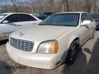 2002 Cadillac DeVille z VIN 1G6KD54Y72U218221, wystawiony jako IAAI lot #41842554 z przebiegiem 117 430 mil mil oraz . Historia ofert i sprzedaży dostępna na DreamBid. Obrazek 2.