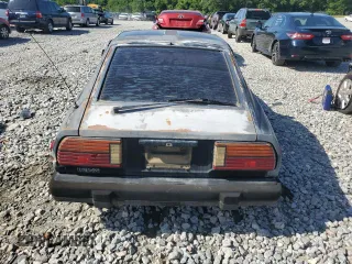 1982 Datsun 280ZX z VIN JN1HZ04S1CX447813, wystawiony jako Copart lot #56649125 z przebiegiem 285 290 mil mil oraz Tytuł czysty. Historia ofert i sprzedaży dostępna na DreamBid. Obrazek 6.