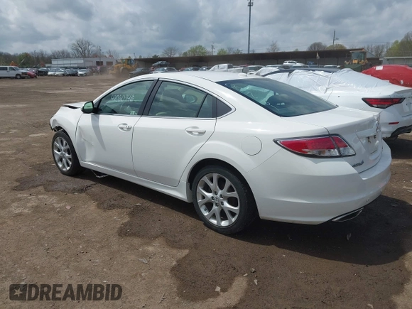 2009 Mazda 6 S Grand Touring with VIN 1YVHP82B995M09281, listed as a IAAI auction lot 42060946 with 102,423 mi miles and . Bid and sale history available at DreamBid. Image 3.