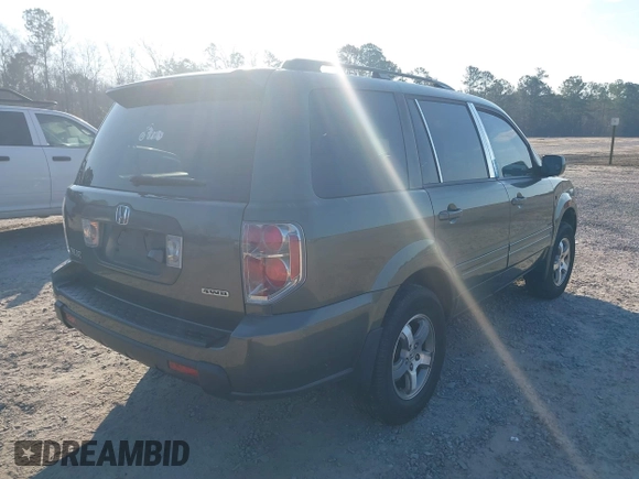 2006 Honda Pilot EX-L with VIN 5FNYF18766B026721, listed as a IAAI auction lot 41690993 with 219,473 mi miles and . Bid and sale history available at DreamBid. Image 4.