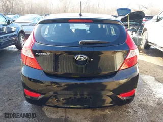 2013 Hyundai Accent GL with VIN KMHCT5AE6DU128989, listed as a IAAI auction lot 41744428 with 92,102 mi miles. Bid and sale history available at carsss.com. Image 16.