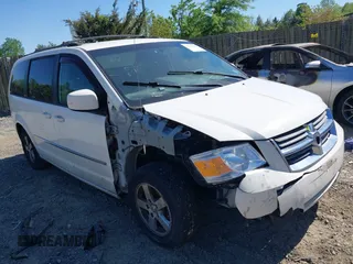 2010 Dodge Grand Caravan SXT with VIN 2D4RN5D12AR210330, listed as a IAAI auction lot 42146969 with 233,607 mi miles and . Bid and sale history available at DreamBid. Image 1.