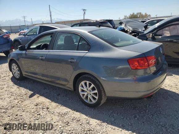 2013 Volkswagen Jetta SE with VIN 3VWDX7AJ3DM271048, listed as a Copart auction lot 59257995 with 122,393 mi miles and Salvage title. Bid and sale history available at DreamBid. Image 2.