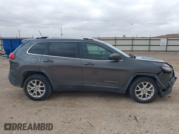 2014 Jeep Cherokee Latitude z VIN 1C4PJLCS1EW319194, wystawiony jako IAAI lot #41710491 z przebiegiem 108 136 mil mil oraz . Historia ofert i sprzedaży dostępna na DreamBid. Obrazek 13.
