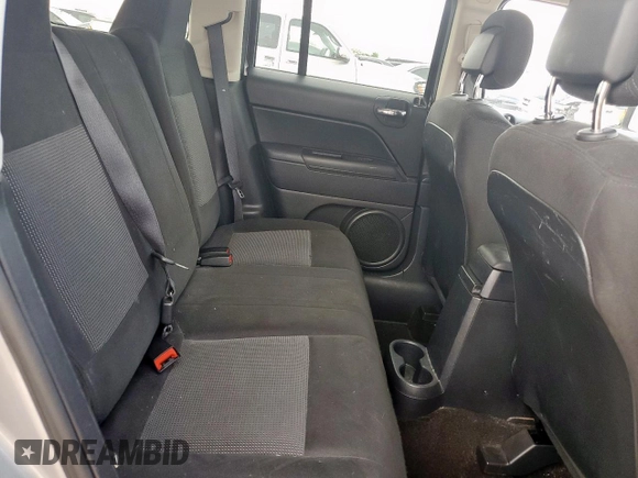 2015 Jeep Patriot Latitude with VIN 1C4NJPFBXFD368160, listed as a Copart auction lot 59235425 with 105,529 mi miles and Salvage title. Bid and sale history available at DreamBid. Image 11.