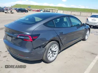 2022 Tesla Model 3 with VIN 5YJ3E1EA6NF144098, listed as a IAAI auction lot 41965360 with 75,597 mi miles. Bid and sale history available at carsss.com. Image 6.