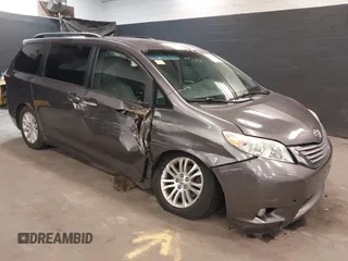 2015 Toyota Sienna XLE with VIN 5TDYK3DC3FS677780, listed as a IAAI auction lot 42155459 with 102,355 mi miles. Bid and sale history available at carsss.com. Image 1.