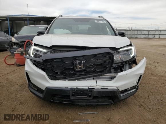 2023 Honda Passport Elite with VIN 5FNYF8H05PB013536, listed as a Copart auction lot 50671155 with 33,815 mi miles and Salvage Title. Bid and sale history available at DreamBid. Image 5.