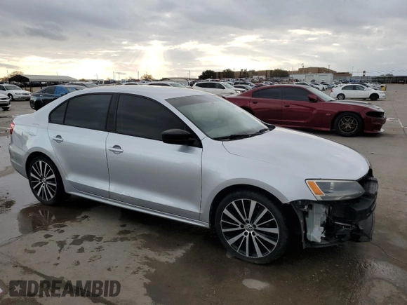 2014 Volkswagen Jetta Sedan S with VIN 3VW2K7AJ0EM311044, listed as a Copart auction lot 85212324 with 128,521 mi miles and Salvage Title. Bid and sale history available at carsss.com. Image 4.