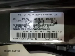 2015 Mazda 3 S Grand Touring with VIN JM1BM1M31F1251166, listed as a Copart auction lot 63251105 with 230,435 mi miles and Salvage title. Bid and sale history available at DreamBid. Image 12.