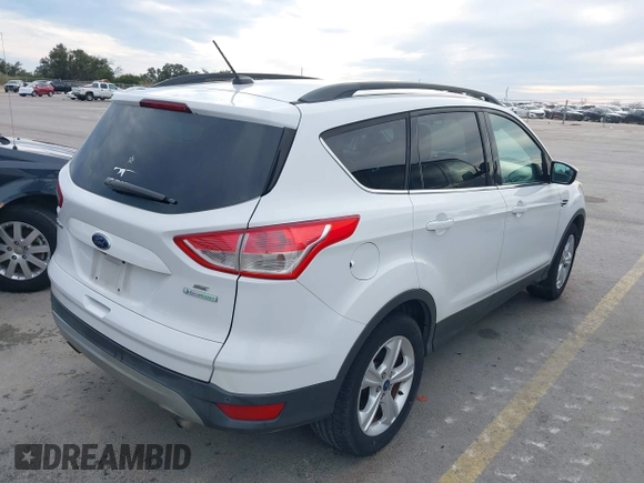 2015 Ford Escape SE with VIN 1FMCU0GX2FUB33893, listed as a IAAI auction lot 41455605 with 128,383 mi miles. Bid and sale history available at carsss.com. Image 4.