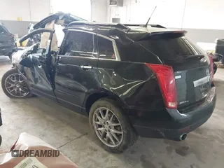 2014 Cadillac SRX Premium Collection with VIN 3GYFNGE35ES636852, listed as a IAAI auction lot 42283604 with 167,983 mi miles and . Bid and sale history available at DreamBid. Image 3.