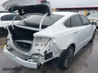 2018 Ford Fusion Titanium with VIN 3FA6P0D90JR247654, listed as a IAAI auction lot 41506643 with 100,907 mi miles. Bid and sale history available at carsss.com. Image 4.