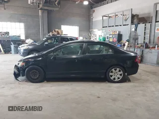 2006 Honda Civic LX z VIN 1HGFA165X6L103659, wystawiony jako IAAI lot #42579482 z przebiegiem 201 436 mil mil oraz . Historia ofert i sprzedaży dostępna na DreamBid. Obrazek 14.