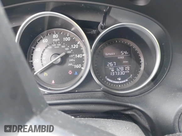 2015 Mazda CX-5 Touring with VIN JM3KE4CY2F0445178, listed as a IAAI auction lot 41828953 with 137,330 mi miles and . Bid and sale history available at DreamBid. Image 7.