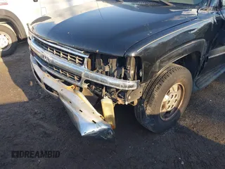 2002 Chevrolet Suburban Z71 with VIN 3GNFK16Z42G199561, listed as a IAAI auction lot 41442707 with 229,823 mi miles. Bid and sale history available at carsss.com. Image 6.