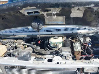 1995 GMC Vandura z VIN 1GDEG25K3SF542874, wystawiony jako IAAI lot #41792770 z przebiegiem 176 778 mil mil oraz . Historia ofert i sprzedaży dostępna na DreamBid. Obrazek 10.