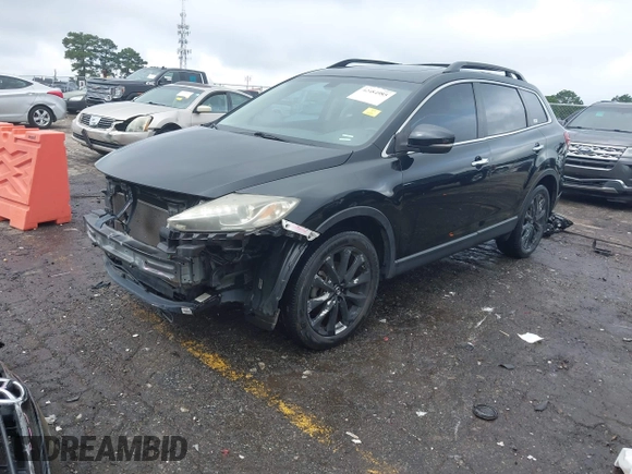 2015 Mazda CX-9 Grand Touring with VIN JM3TB2DA1F0464517, listed as a IAAI auction lot 42484985 with 104,932 mi miles and . Bid and sale history available at DreamBid. Image 19.