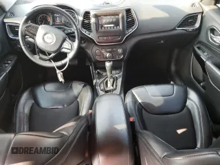 2019 Jeep Cherokee Altitude with VIN 1C4PJLLB2KD392971, listed as a Copart auction lot 59190355 with 163,471 mi miles and Salvage title. Bid and sale history available at DreamBid. Image 8.