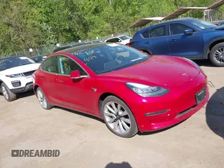 2018 Tesla Model 3 Long Range Battery z VIN 5YJ3E1EA3JF047287, wystawiony jako IAAI lot #42099771 z przebiegiem 120 470 mil mil oraz . Historia ofert i sprzedaży dostępna na DreamBid. Obrazek 1.