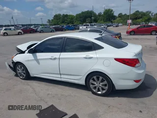 2014 Hyundai Accent GLS with VIN KMHCU4AE6EU766796, listed as a IAAI auction lot 41933743 with 99,142 mi miles. Bid and sale history available at carsss.com. Image 14.
